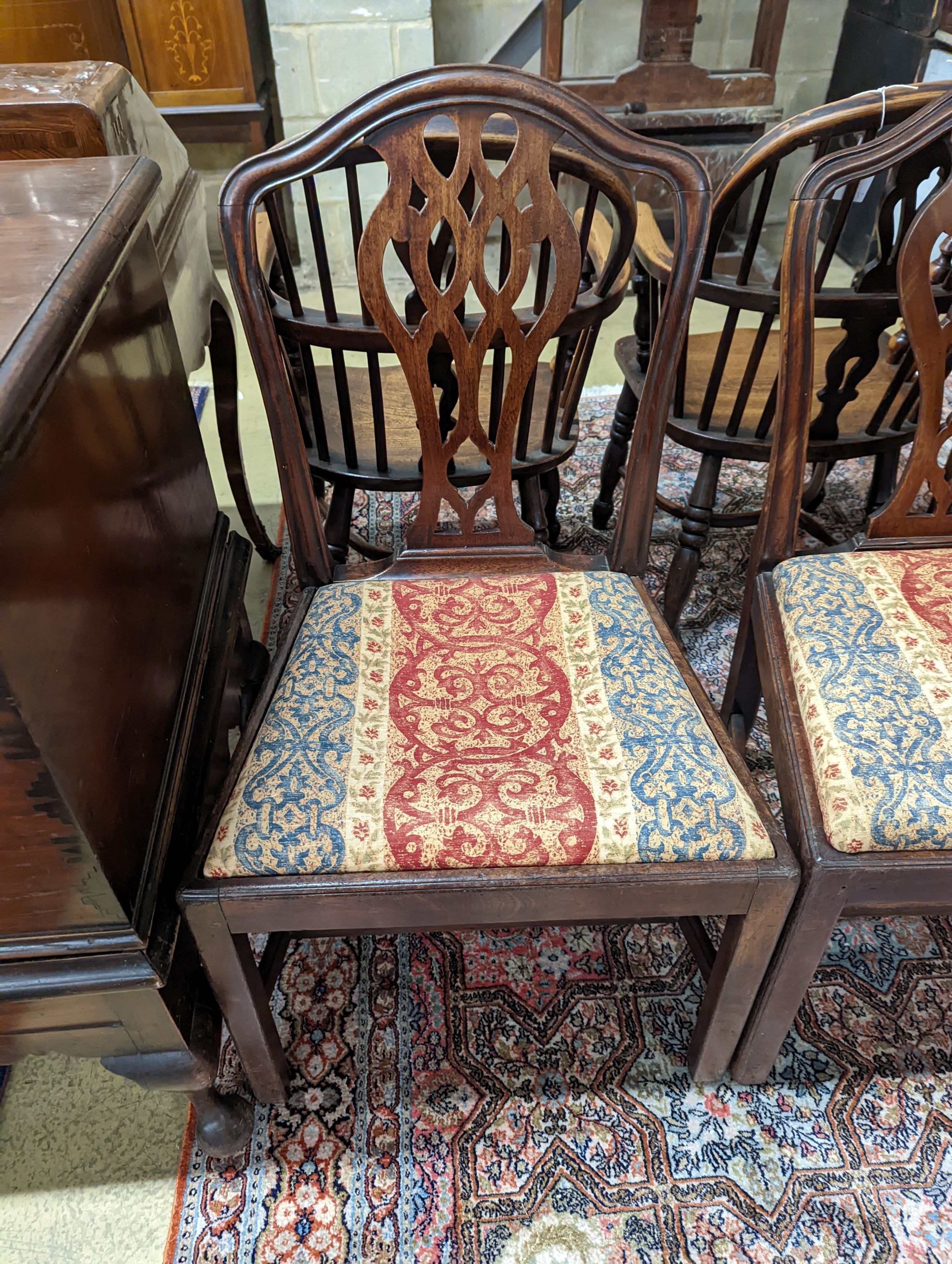 A pair of George III Hepplewhite period mahogany chairs. H-93cm.